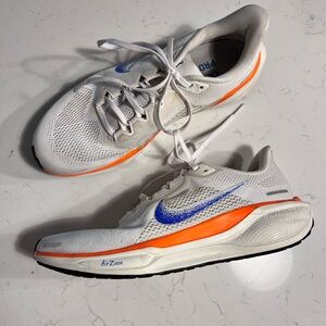 NIKE Air Zoom Pegasus 41 running shoes in a white, blue, and orange colorwa